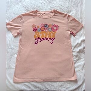 Women's medium "stay groovy" t shirt in light pink color.